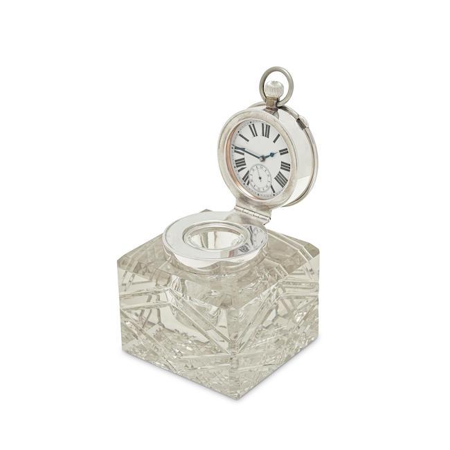 An Edwardian silver-mounted glass combination inkwell and desk time piece John Grinsell & Sons, London 1904
