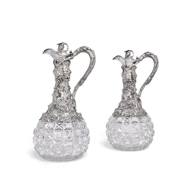 A pair of Victorian silver-mounted cut-glass claret jugs Cartwright, Hirons & Woodward, Birmingham 1856