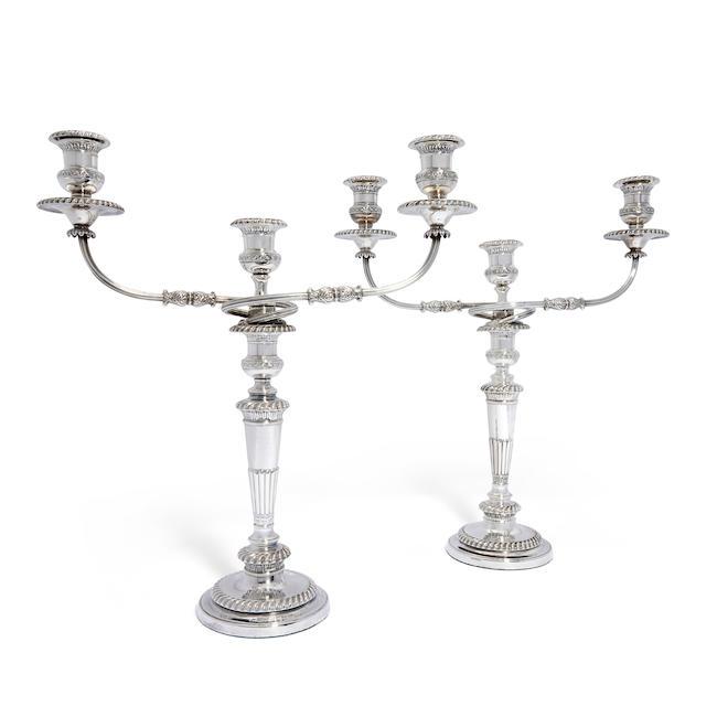 A pair of George III silver three-light candelabra Smith Tate & Co (George Smith, Robert Tate, William Nicholson & Ewin Hoult), Sheffield 1816 (2)