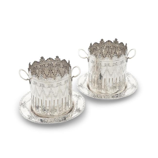 A pair of silver two-handled syphon bottle holders Britton, Gould & Co, Birmingham 1927 (2)
