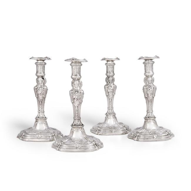 A good set of four Victorian cast silver candlesticks in the French 17th century style James Garrard, London 1888, incuse stamped R & S Garrard London