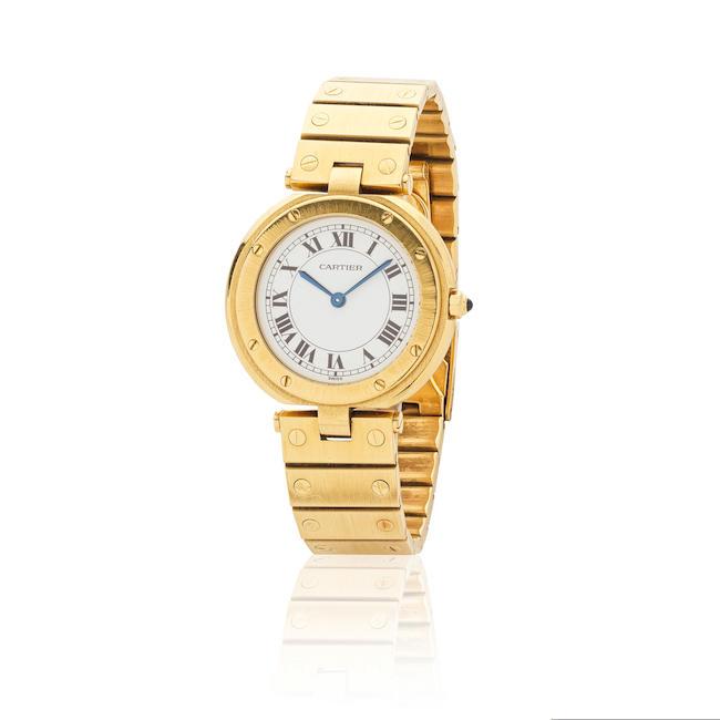 Cartier. A mid-size 18K gold quartz bracelet watch Cartier. Montre bracelet de taille medium en or jaune 18K (750) mouvement quartz Santos Vendôme Ronde, Ref: 8191, Circa 1990