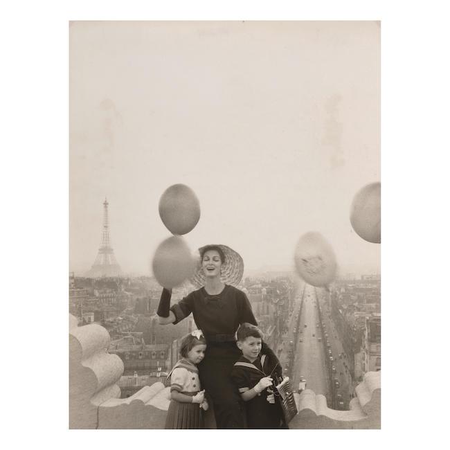 Gleb Derujinsky(1888-1975)Carmen Dell'Orefice Wearing a Christian Dior "Caban" 25 Dress, Atop the Arc de Triomphe, Paris (for 'Harper's Bazaar')